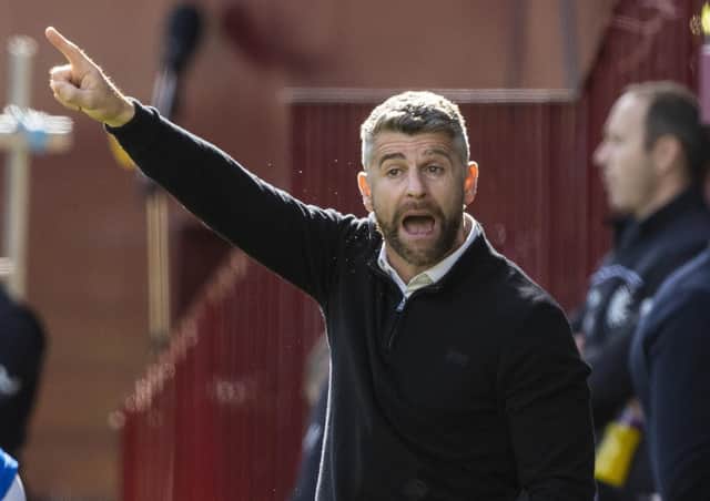 Stephen Robinson refused to blame the penalty decisions for his side's defeat. Picture: SNS.