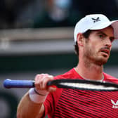 Britain's Andy Murray reacts during his first round defeat by Switzerland's Stan Wawrinka at the French Open in Paris. Picture: Anne-Christine Poujoulat/AFP via Getty Images