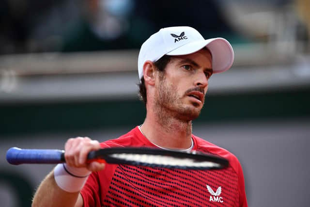 Britain's Andy Murray reacts during his first round defeat by Switzerland's Stan Wawrinka at the French Open in Paris. Picture: Anne-Christine Poujoulat/AFP via Getty Images