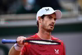 Britain's Andy Murray reacts during his first round defeat by Switzerland's Stan Wawrinka at the French Open in Paris. Picture: Anne-Christine Poujoulat/AFP via Getty Images
