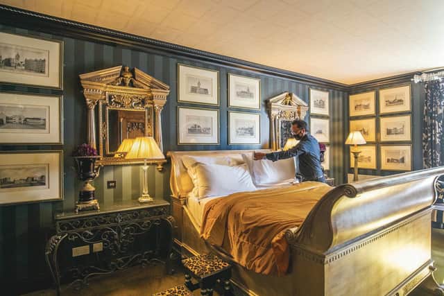 One of Prestonfield's 23 unique bedrooms which are filled with statement antiques and tactile furnishings