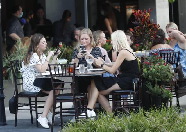 After restaurants in Florida were allowed to return to full-capacity seating, the number of Covid infections rose sharply (Picture: Octavio Jones/Getty Images)