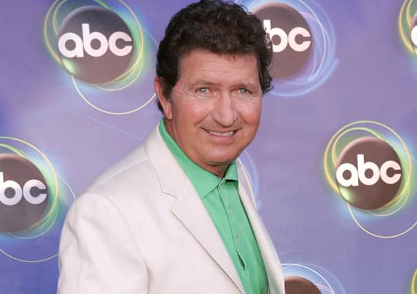 Mac Davis arrives at a Hollywood party in 2005 (Photo by Mark Mainz/Getty Images)