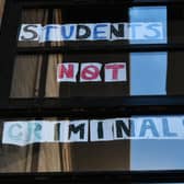 Students at Glasgow University's Murano Street residence complain to the world that they are being treated like criminals (Picture: John Devlin)