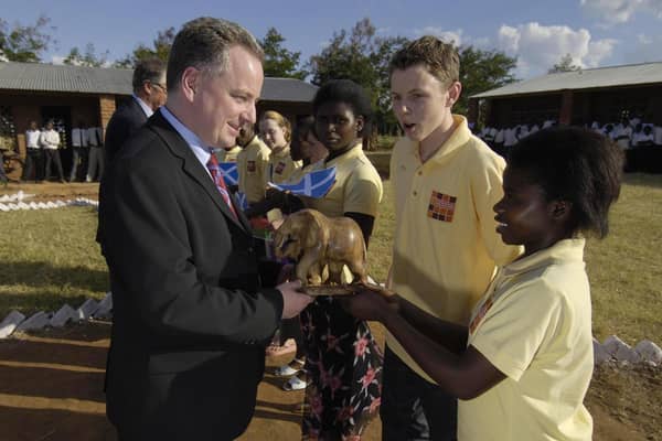 The then First Minister Jack McConnell meets Malawian and Scottish children at Minga Secondary School, Malawi, which is twinned with a school in Orkney, in 2005 (Picture: Donald MacLeod/The Scotsman/Pool/PA.