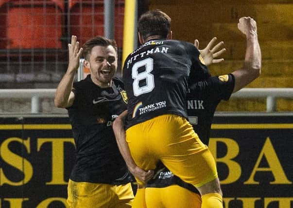 Livingston's Alan Forrest celebrates his winning goal. Picture: Ross MacDonald / SNS