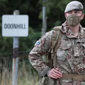 A soldier from the Royal Scots Dragoon Guards wearing a face mask during Exercise Solway Eagle