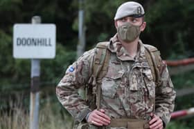A soldier from the Royal Scots Dragoon Guards wearing a face mask during Exercise Solway Eagle