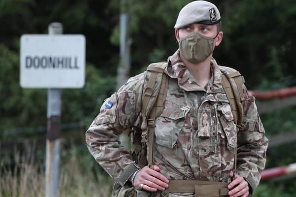A soldier from the Royal Scots Dragoon Guards wearing a face mask during Exercise Solway Eagle