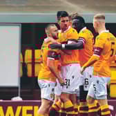 Motherwell players come together to celebrate Allan Campbell's goal. Picture: Rob Casey/SNS