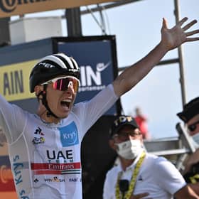 Tadej Pogacar of Slovenia celebrates yesterday as he crosses the finish line at the 15th stage of the Tour de France. Picture: AFP/Getty