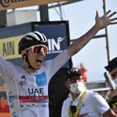 Tadej Pogacar of Slovenia celebrates yesterday as he crosses the finish line at the 15th stage of the Tour de France. Picture: AFP/Getty