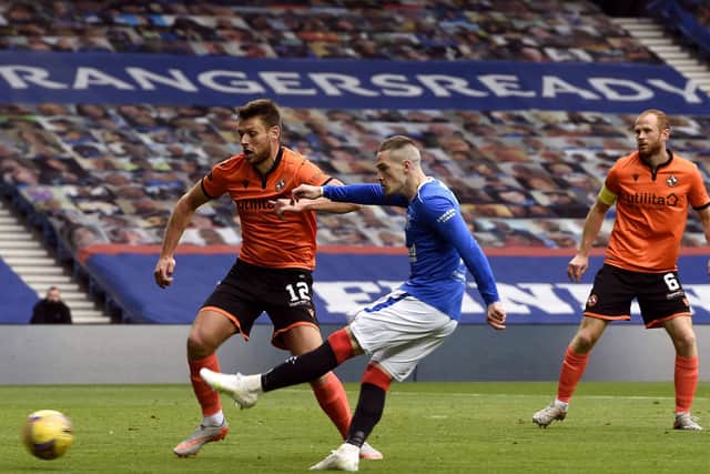 Ryan Kent fires Rangers into the lead against Dundee United. Picture: Ian Rutherford/PA