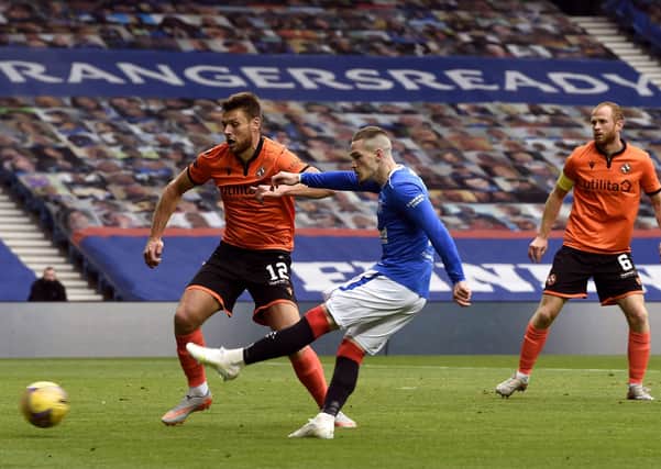 Ryan Kent fires Rangers into the lead against Dundee United. Picture: Ian Rutherford/PA