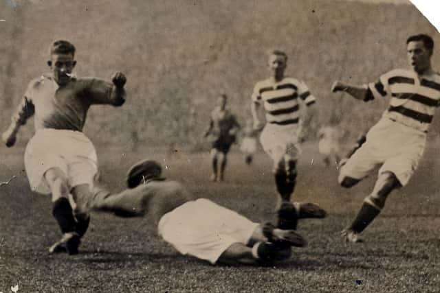 John Thomson dives at the feet of Sam English at Ibrox in 1931, with horrific consequences.