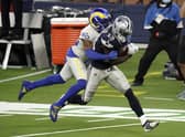 Dallas Cowboys wide receiver Michael Gallup (No 13) makes a catch but is called for offensive pass interference on Los Angeles Rams cornerback Jalen Ramsey. Picture: Jae C. Hong
