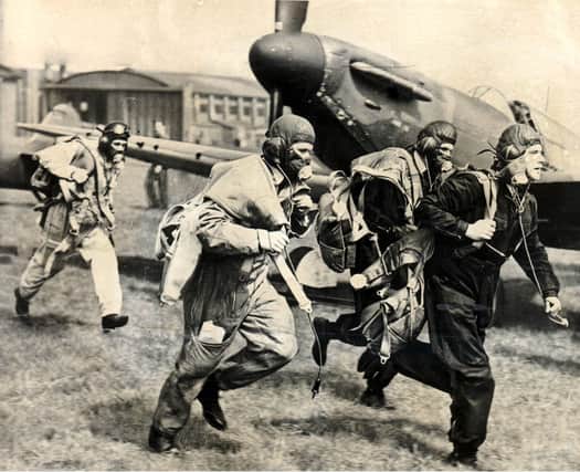 RAF Spitfire fighter pilots scramble to get airborneduring the Battle of Britain (Picture: ANL/Shutterstock)