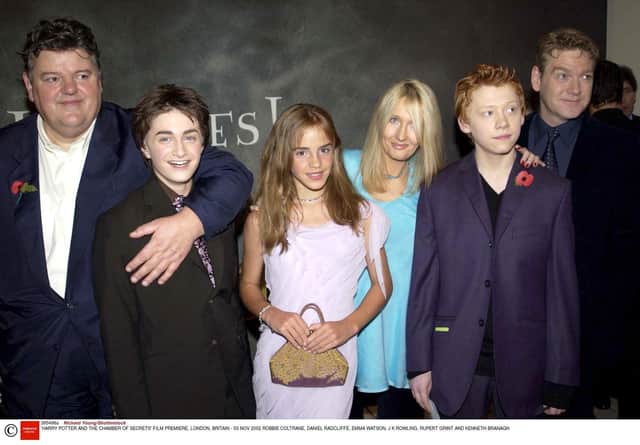 Robbie Coltrane, Daniel Radcliffe, Emma Watson and JK Rowling in November 2002