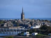 The steeple of Old and St Andrew’s Church towers over Montrose’s High Street. 
Picture: Michael Gillen