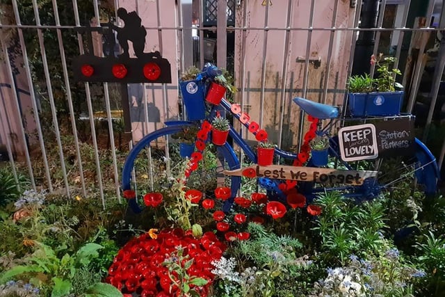The flower bed decorated for Remembrance Sunday