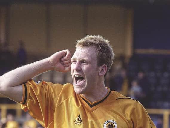 Simon Rusk celebrates at full time.