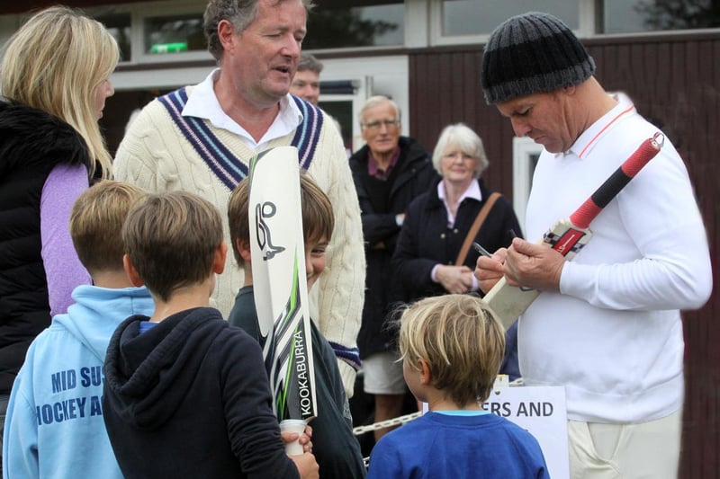 Piers Morgan lures some top cricket names and other famous faces to his annual match at Newick - Shane Warne signs autographs / Pictures: Ron Hill