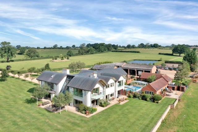 Naseby Lodge in Northamptonshire is on the market through King West in Market Harborough. The home has seven bedrooms and includes an outdoor swimming pool.