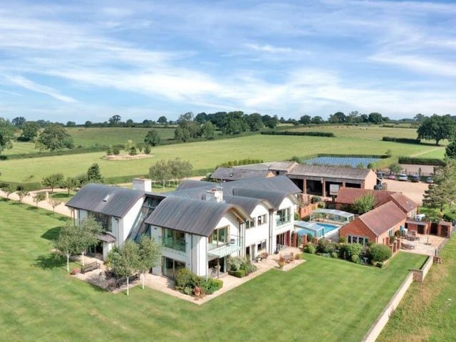Naseby Lodge in Northamptonshire is on the market through King West in Market Harborough. The home has seven bedrooms and includes an outdoor swimming pool.