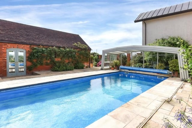 The covered swimming pool at Naseby Lodge is sheltered by surrounding buildings at the home