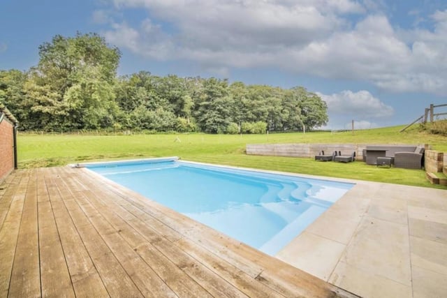 The home in Boughton has its very own heated swimming pool and a self-contained pool room with shower.