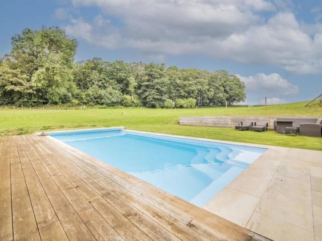 The home in Boughton has its very own heated swimming pool and a self-contained pool room with shower.