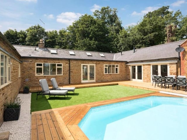 The Overstone Park home includes a private and personal courtyard surrounding a heated pool.