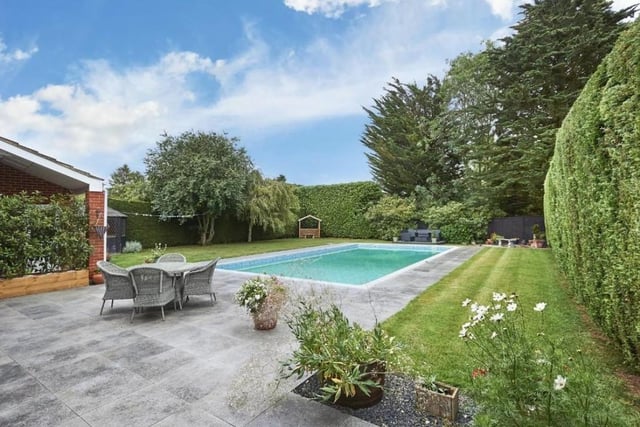 The home in Barton Seagrove has an outdoor pool in the back garden.