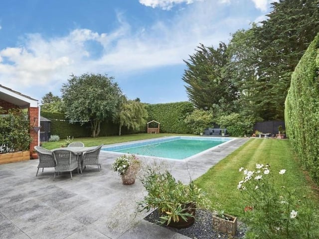 The home in Barton Seagrove has an outdoor pool in the back garden.