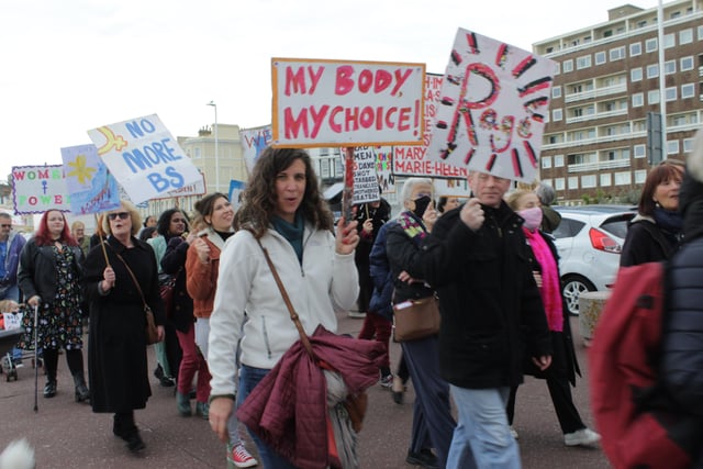Women's Voice supporters march through the streets of Hastings SUS-211025-115202001