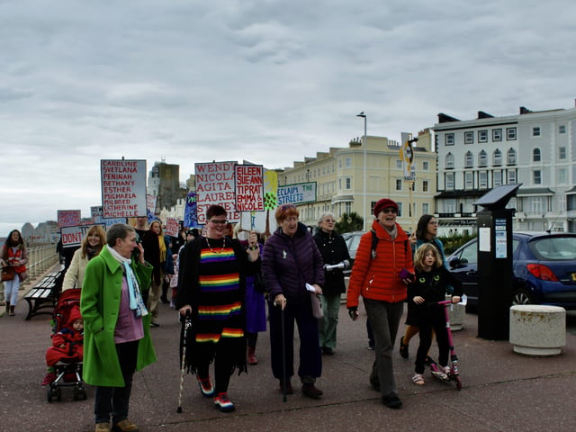 Women's Voice supporters march through the streets of Hastings SUS-211025-115137001