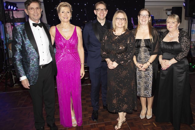 Staff, Volunteers and friends join for a group photo with ex-staff member Mandy Whitman (in pink), who retired last year after over 20 years with the charity as a sight care advisor, who chief executive Kirstie Thomas thanked in her speech for the support she personally received at the point of her diagnosis