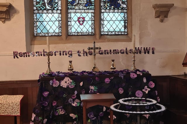 A purple poppy display in Stanground to memorialise the fallen animals in the war.