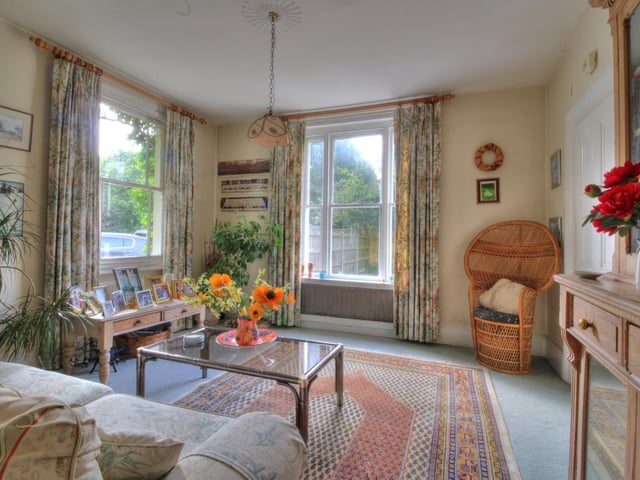 The property has 5 reception rooms