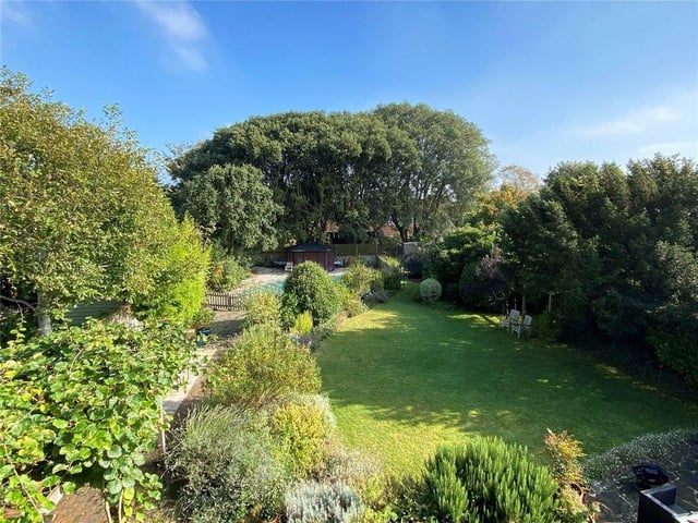 It comes with extensive walled gardens with a heated swimming pool. SUS-211011-105516004