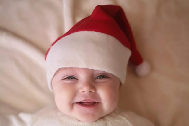 Alexandra Joanne Ball was born June 23, weighing nine pounds. She will be celebrating her first Christmas this year with a big smile on her face.