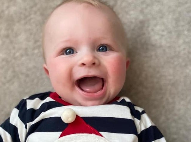This smiley baby, Archie Austin Spencer, was born on 11 July, weighing seven pounds.