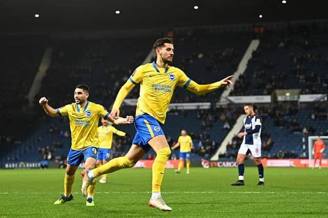 Jakub Moder celebrates his equaliser at West Brom in the FA Cup