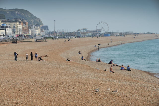Hastings seafront pictured on September 6 last year during the mini heatwave. SUS-210609-132657001