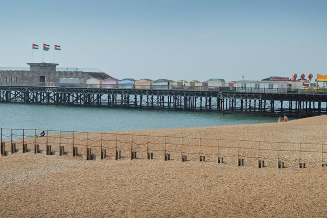 Hastings seafront pictured on September 6 last year during the mini heatwave.

Hastings pier SUS-210609-132723001