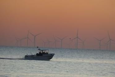A boat passes by the Rampion wind farm, just off Beachy Head. Picture by Mandy Turner SUS-220202-103945001