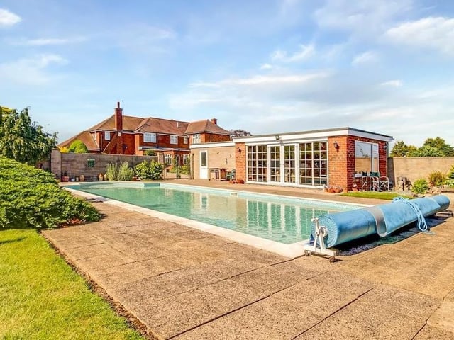 The enclosed outdoor heated swimming pool.