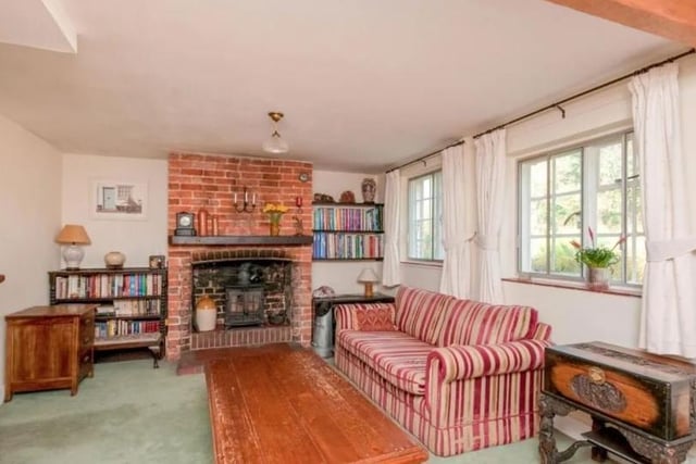 This beautiful cottage nestled at the foot of Mount Caburn is the most popular property in terms of page views this month, according to Zoopla. SUS-220203-145639001