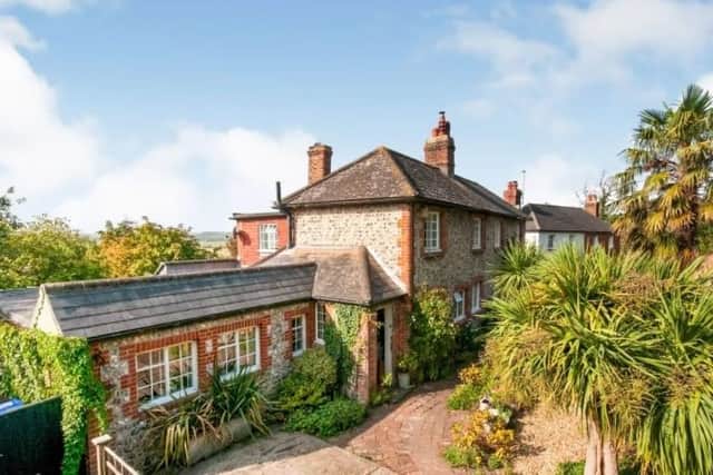 This beautiful cottage nestled at the foot of Mount Caburn is the most popular property in terms of page views this month, according to Zoopla. SUS-220203-145358001
