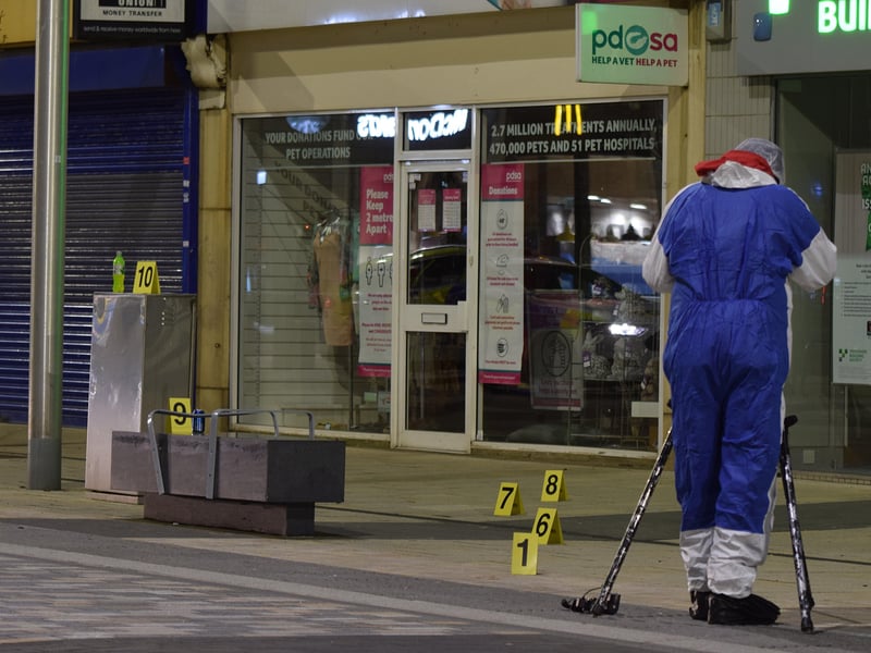 Police at the scene. Photo by Dan Jessup